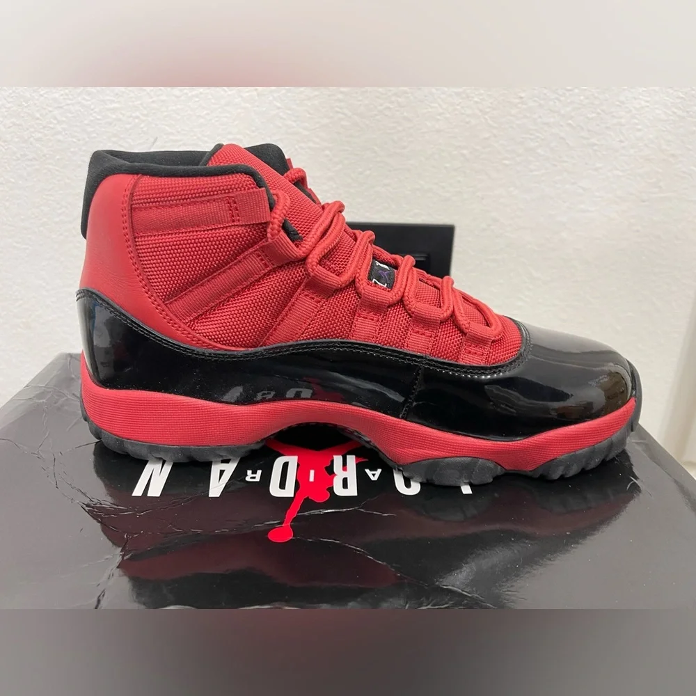 New! Unworn! Air Jordan 11 retro red and black men’s size 8